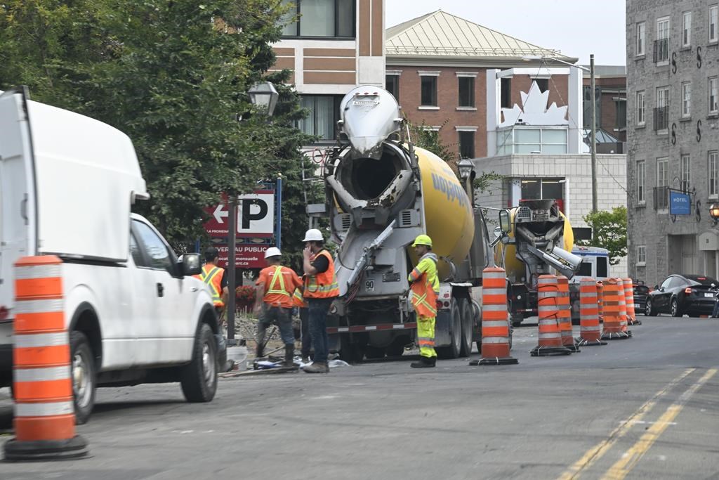 Workers on a construction site, Thursday, Sept. 19, 2024, in Quebec City. The Quebec government is facing criticism for a program meant to boost the number of construction workers in the province that has fallen far short of its target. THE CANADIAN PRESS/Jacques Boissinot.