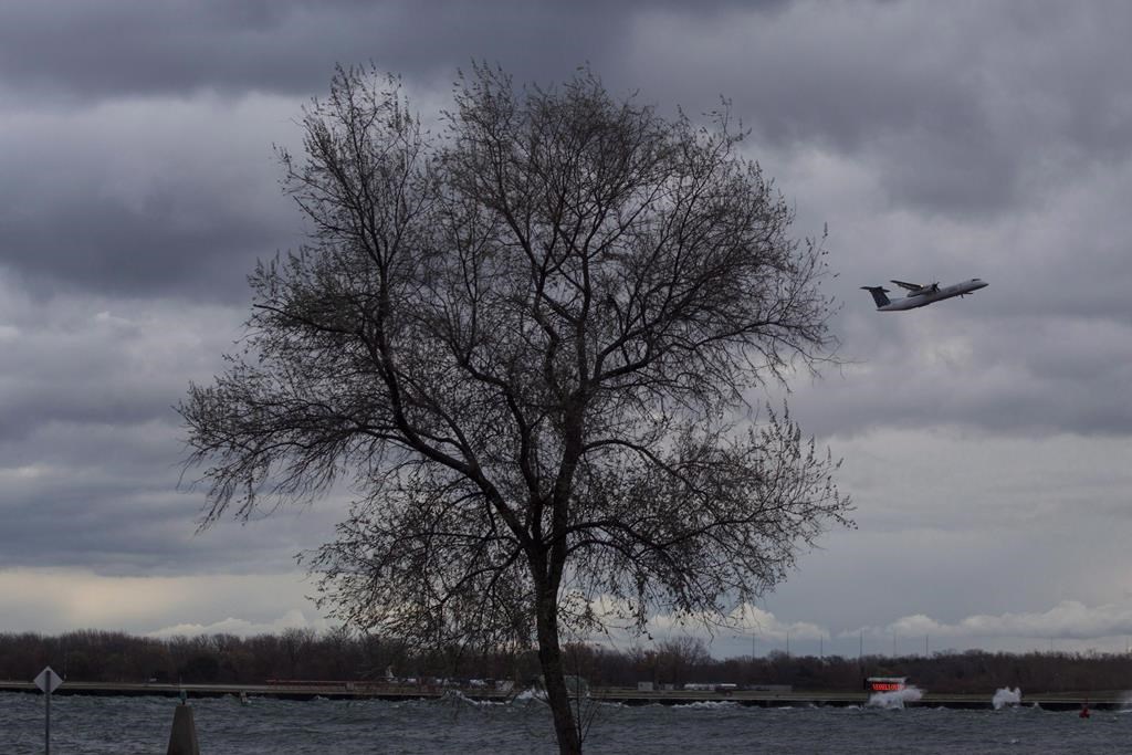 Toronto island airport lease extended for up to 12 years
Toronto city council is granting the island airport a lease extension that would keep the hub open for at least another two decades. A Porter Airlines plane takes off from Toronto's Island Airport on Friday, Nov.13, 2015. THE CANADIAN PRESS/Chris Young.