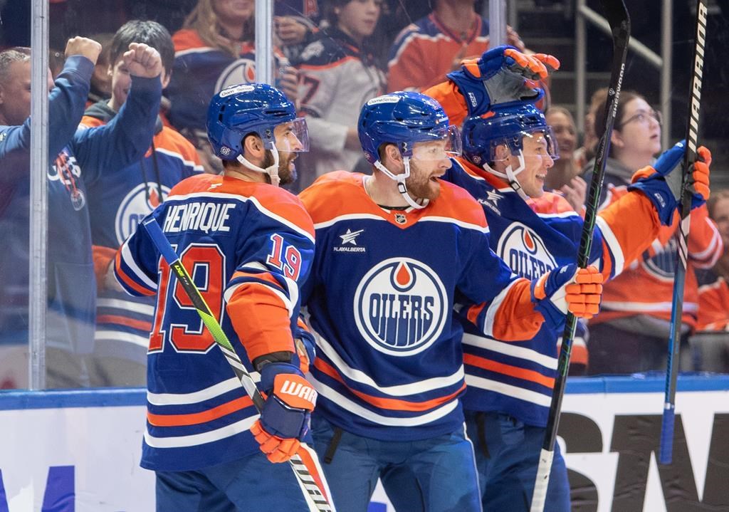 Edmonton Oilers' Adam Henrique (19) Connor Brown (28) and Jeff Skinner (53) celebrate their goal against the Philadelphia Flyers during second period NHL action in Edmonton on Tuesday Oct. 15, 2024. THE CANADIAN PRESS/Amber Bracken.