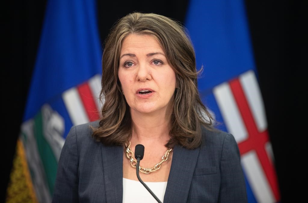 Alberta Premier Danielle Smith speaks in Edmonton on Wednesday April 10, 2024. Canada's economic productivity crisis can only be solved if the federal and provincial governments come together to address issues like major project approvals and inter-provincial trade barriers, Alberta's premier said Wednesday.