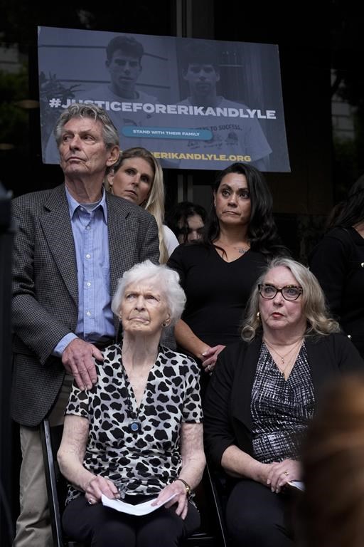 Kitty Menendez' sister, Joan Andersen VanderMolen, bottom left, and niece Karen VanderMolen, right, sit together during a press conference to announce developments on the case of brothers Erik and Lyle Menendez, Wednesday, Oct. 16, 2024, in Los Angeles.