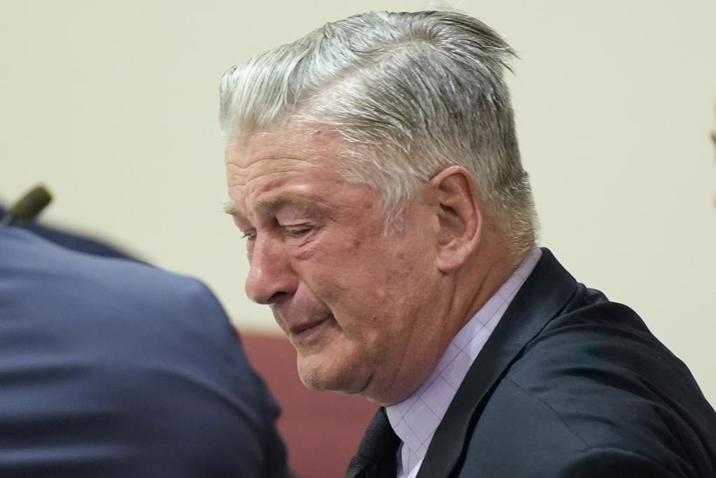 Alec Baldwin reacts after the judge threw out the involuntary manslaughter case for the 2021 fatal shooting of cinematographer Halyna Hutchins during filming of the Western movie "Rust," Friday, July 12, 2024, in Santa Fe, N.M.