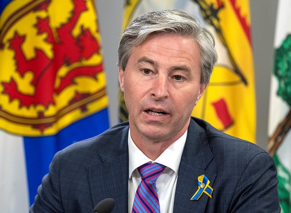 Nova Scotia Premier Tim Houston fields a question at a meeting of the Council of Atlantic Premiers in Halifax in 2022.