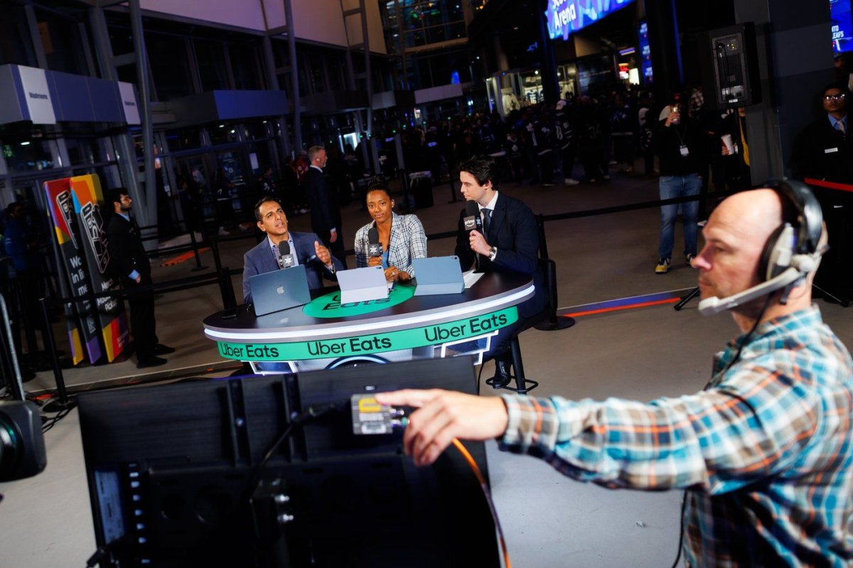 From left, Adnan Virk, Blake Bolden, and Thomas Hickey record their analysis of the night during the Toronto Maple Leafs pre-season hockey game against the Detroit Red Wings as Amazon rehearses their production of Monday Night Hockey, at Scotiabank Arena in Toronto, Saturday, October 5, 2024.