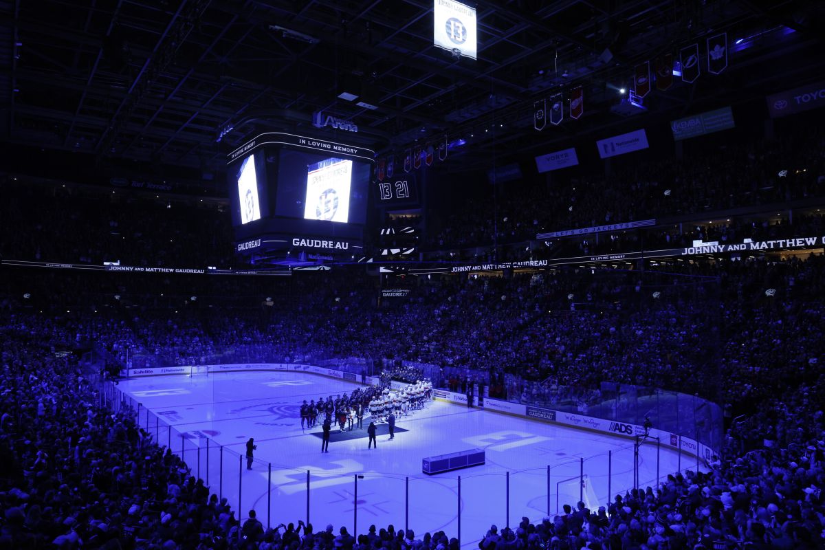 Blue Jackets' Johnny Gaudreau's family watches a #13 banner being raised during a ceremony before the start of an NHL hockey game between the Columbus Blue Jackets and the Florida Panthers. Tuesday, Oct. 15, 2024, in Columbus, Ohio.