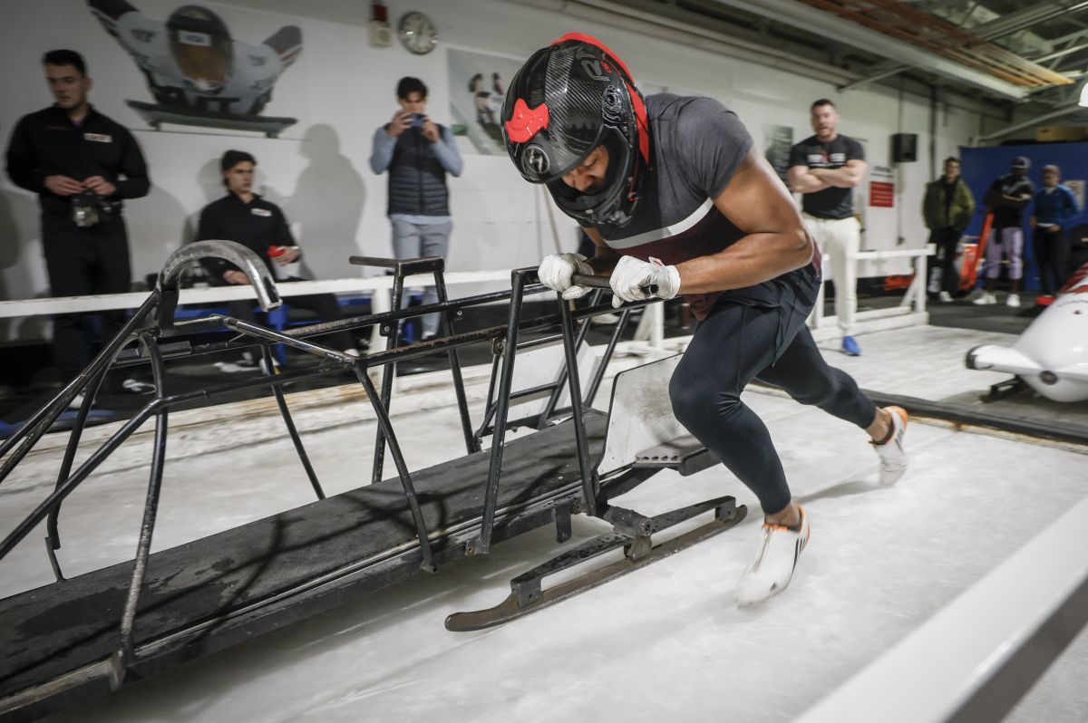 Jamaican Yohan Eskrick-Parkinson, a diver who is trying out for Canada's bobsleigh team, trains in Calgary, Friday, Oct. 25, 2024.