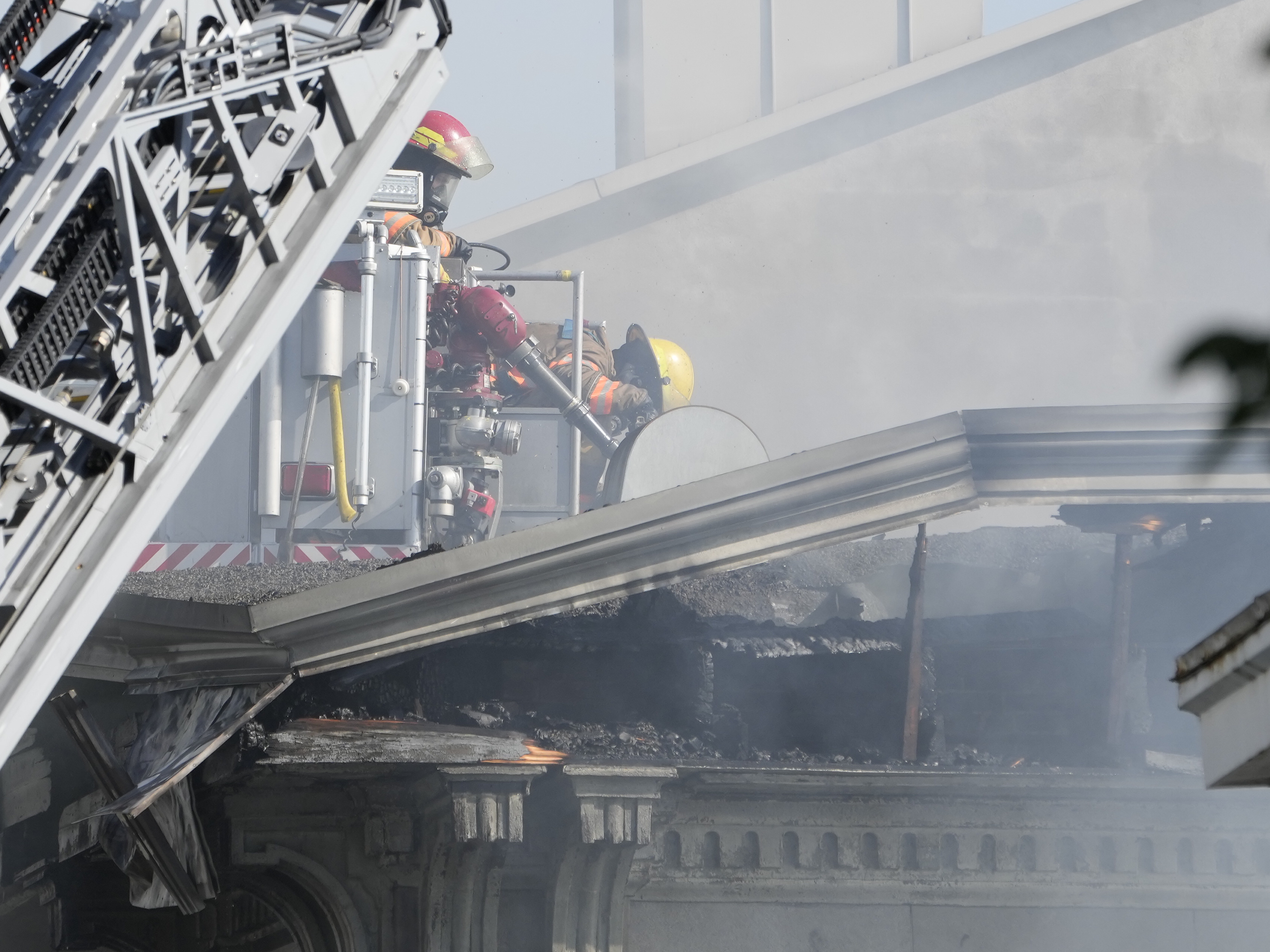 Old Montreal fire under control, 2 bodies pulled from rubble: police