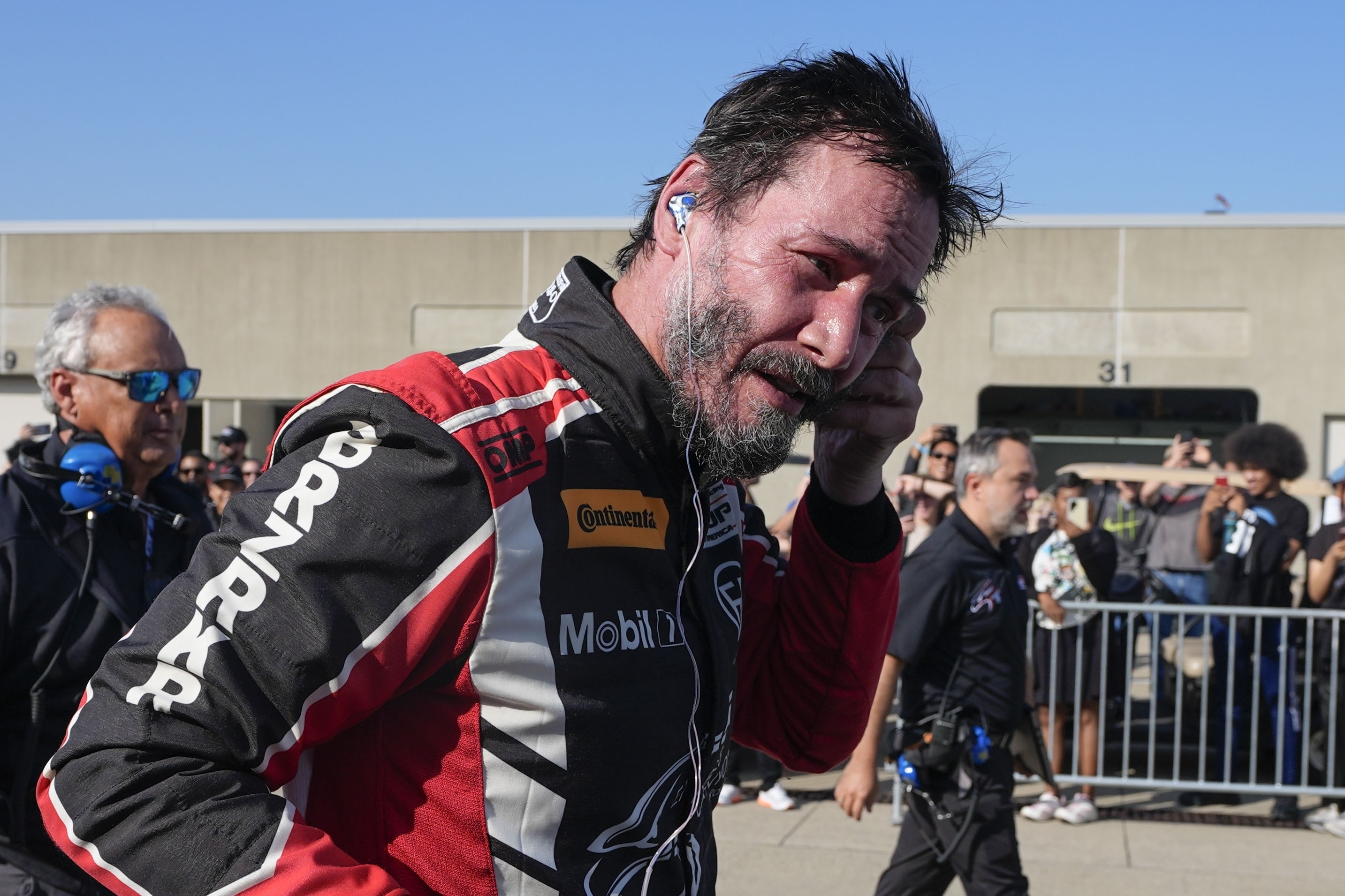 Keanu Reeves spins out of control in racing debut at Indianapolis Motor Speedway