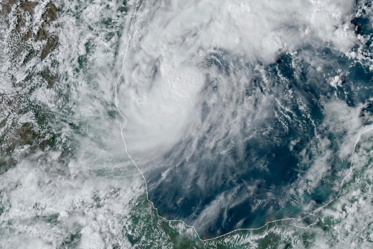 This GOES-16 GeoColor satellite image taken at 4:50 p.m. EDT and provided by National Oceanic and Atmospheric Administration (NOAA) shows Tropical Storm Milton, center, off the coast of Mexico in the Gulf of Mexico, Saturday, Oct. 5, 2024.