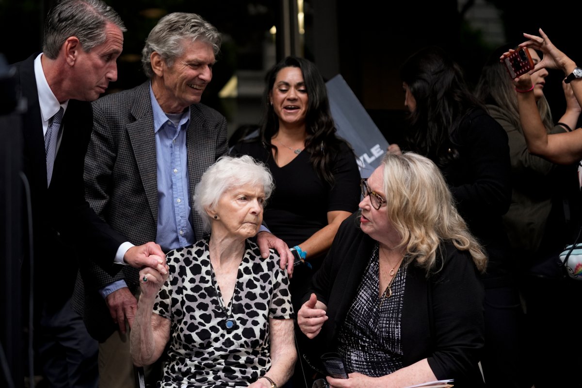 Kitty Menendez' sister, Joan Andersen Vandermolen, bottom left, and niece Karen Vandermolen, right, sit together during a press conference to announce developments on the case of brothers Erik and Lyle Menendez, Wednesday, Oct. 16, 2024, in Los Angeles.