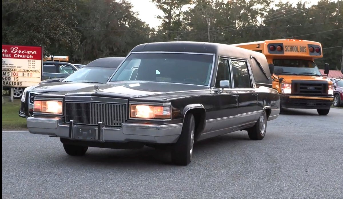 A hearse heads to Meridian Dock in McIntosh county where several people after a gangway collapsed plunging them into the water, on Sapelo Island, Ga., in McIntosh county, Sunday, Oct. 20, 2024.