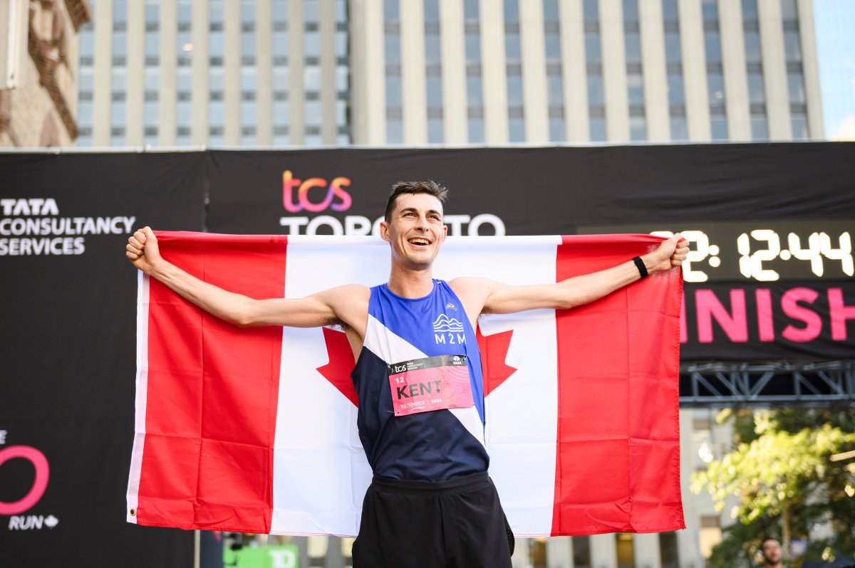 Justin Kent, the fastest Canadian runner finishes the 2024 TCS Toronto Waterfront Marathon, in Toronto, Sunday, Oct. 20, 2024. THE CANADIAN PRESS/Christopher Katsarov