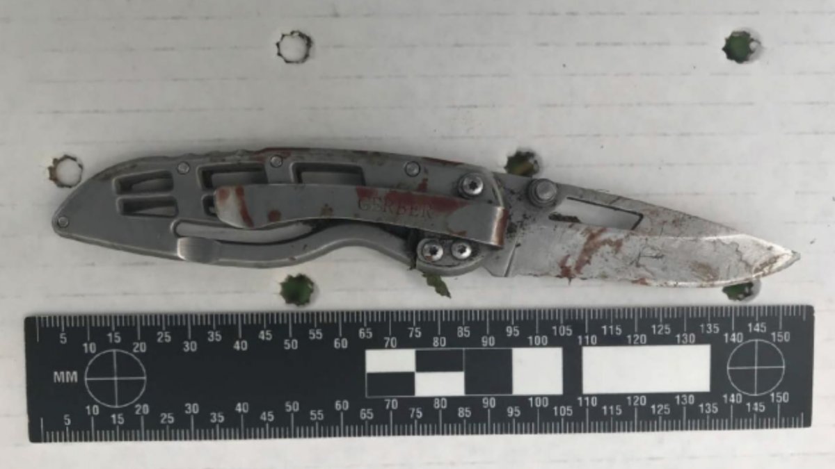 A knife the man possessed when resisting officers, which ASIRT said was used to stab a police dog. 