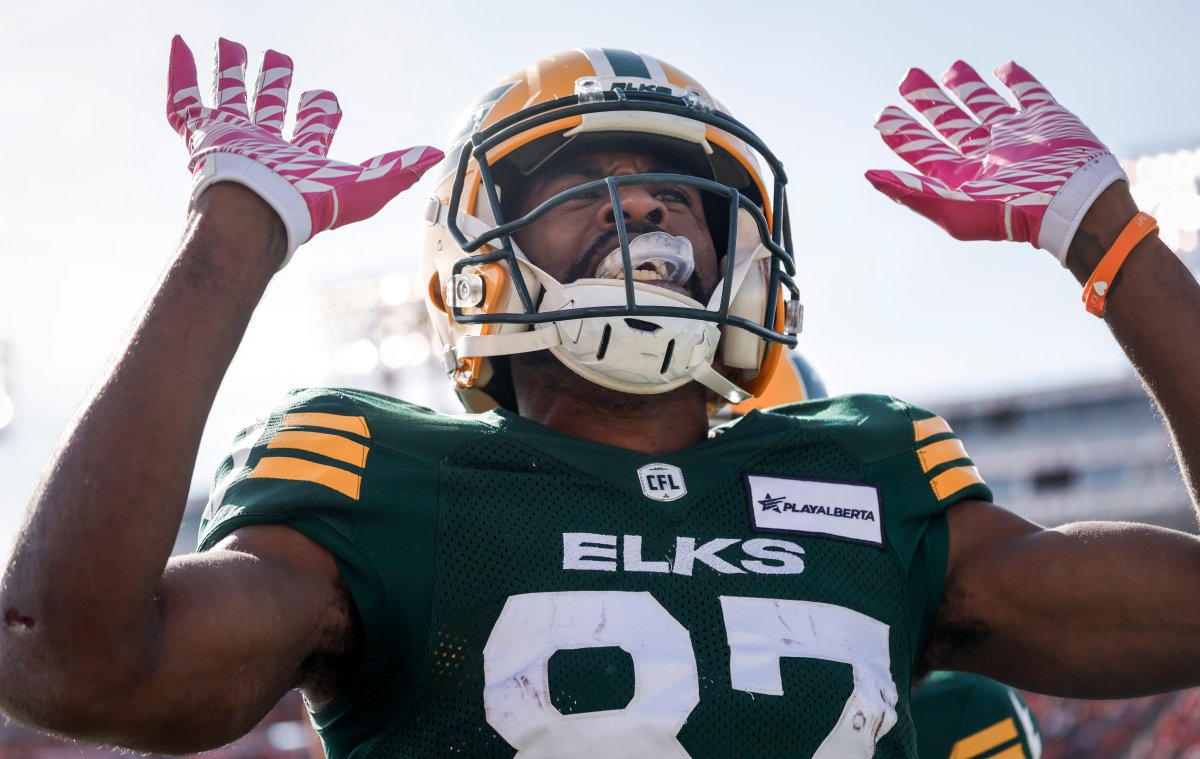 Edmonton Elks' Eugene Lewis celebrates his touchdown during first half CFL football action against the Calgary Stampeders in Calgary, Saturday, Oct. 12, 2024.