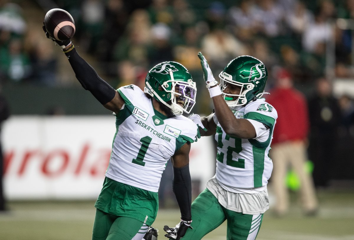 Saskatchewan Roughriders' C.J. Reavis (1) and DaMarcus Fields (22) celebrate a fumble recovery against the Edmonton Elks during second half CFL action in Edmonton, on Saturday October 5, 2024.