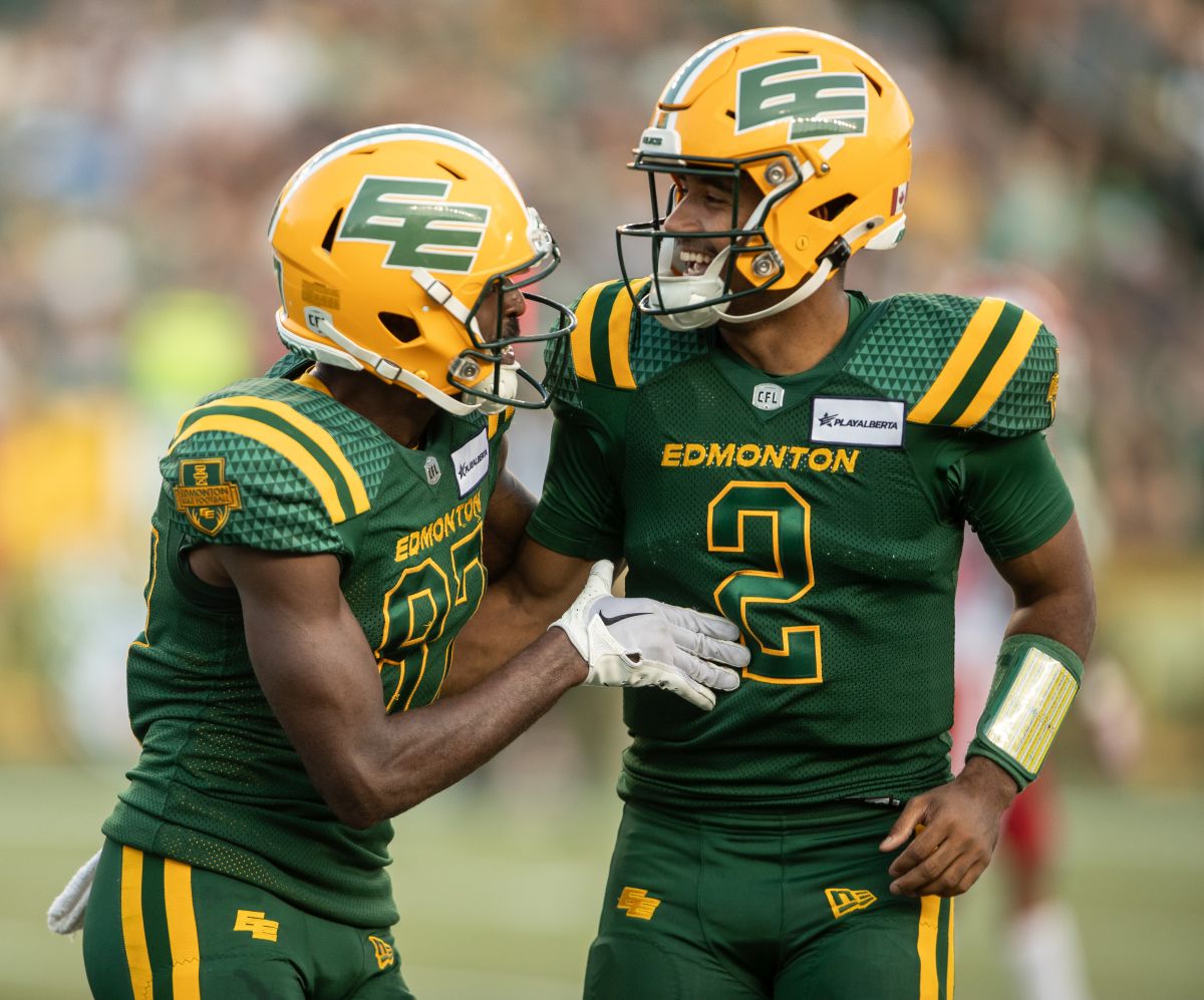 Edmonton Elks Eugene Lewis (87) celebrates his touchdown against the Calgary Stampeders with quarterback Tre Ford (2) during CFL action in Edmonton, Alberta, on Saturday September 7, 2024.