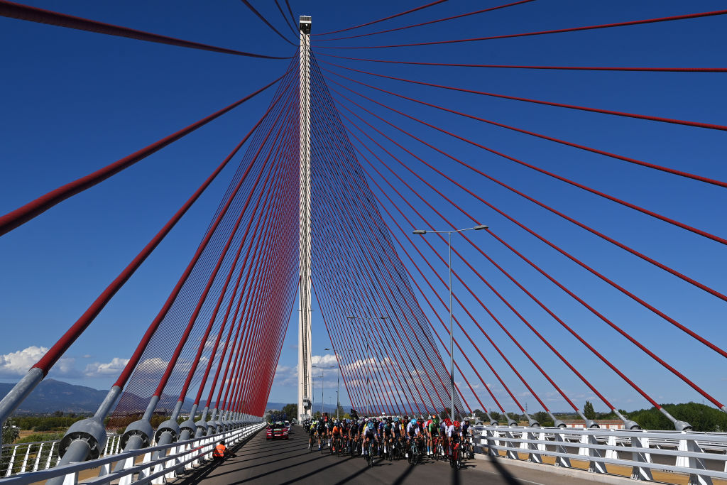 FILE - A general view of the peloton passing through the Castilla-La Mancha bidge during the Tour of Spain in 2022.