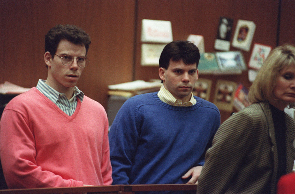 FILE - Erik Menendez (L) and his brother Lyle (R) listen during a pre-trial hearing, on December 29, 1992 in Los Angeles after the two pleaded innocent in the August 1989 shotgun deaths of their wealthy parents, Jose and Mary Louise Menendez of Beverly Hills, Calif.