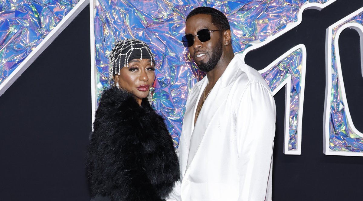 Sean "Diddy" Combs and his mother, Janice Smalls Combs on a red carpet.