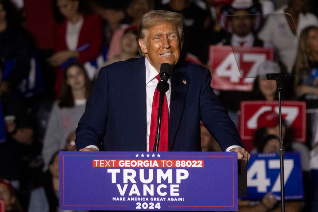 Former US President and Republican presidential candidate Donald Trump speaks during a campaign rally at the McCamish Pavilion in Atlanta, Georgia, October 28, 2024.