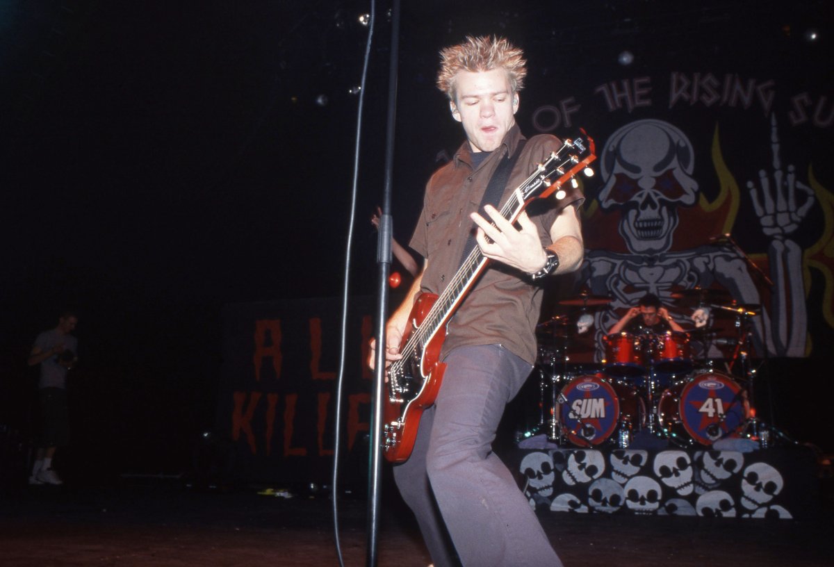 Deryck Whibley of Sum 41 performs on stage at Brixton Academy, London, 2001.