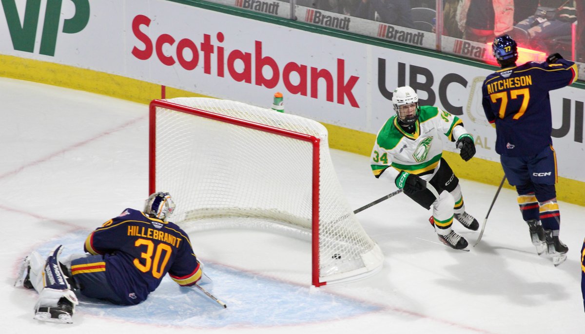 Cohen Bidgood celebrates Evan Van Gorp's game-winning goal on opening night of Canada Life Place.