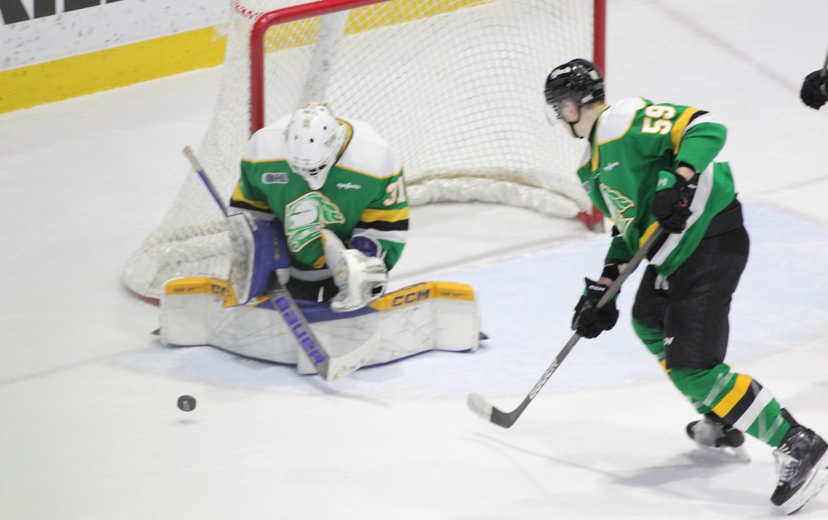 Austin Elliott of the London Knights makes a save during a 5-2 victory by London over the Sarnia Sting on Oct. 27, 2024.