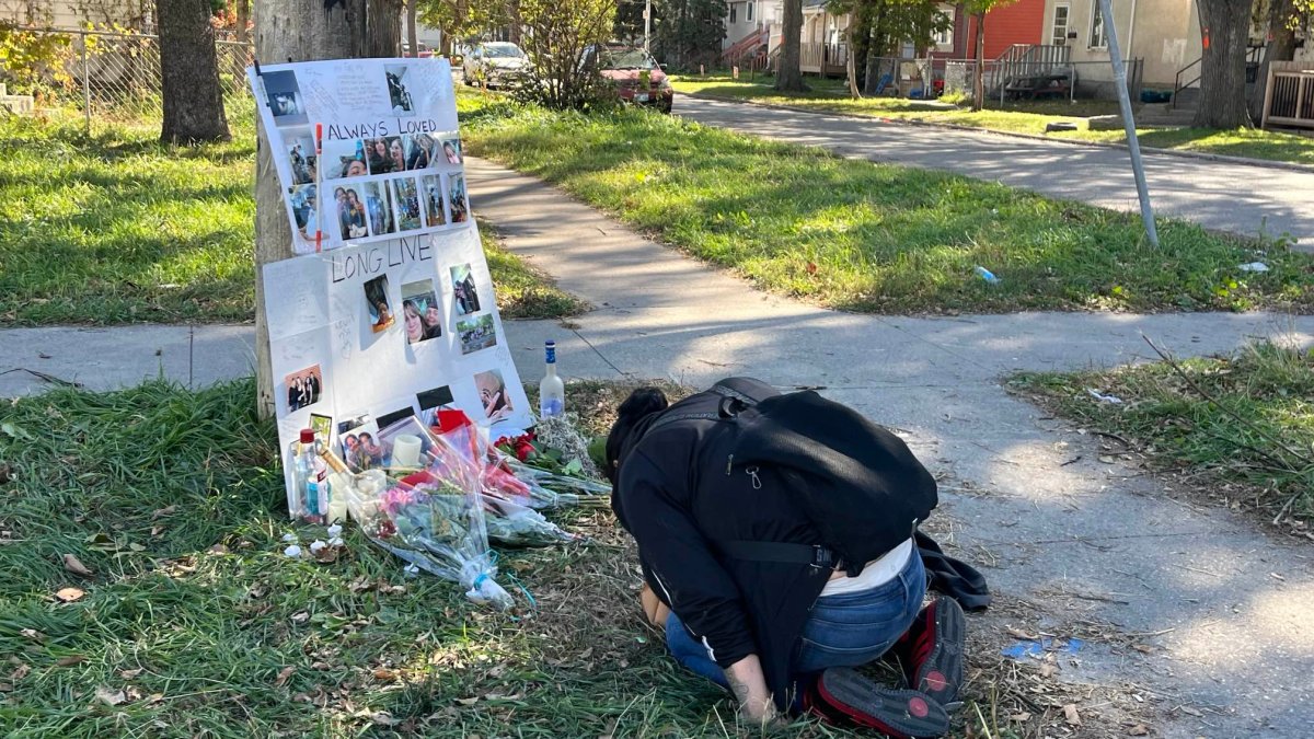 A makeshift memorial is seen at near the site of a weekend shooting that left a 16-year-old dead.