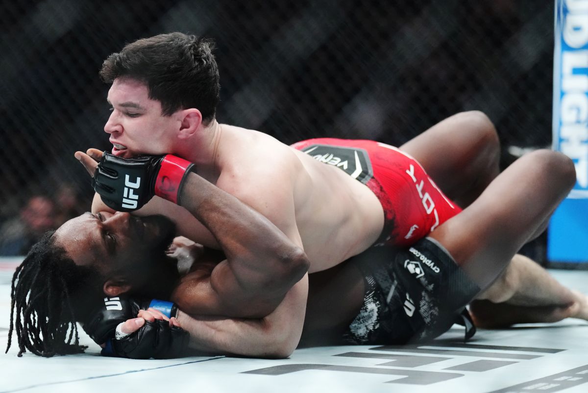 Mike Malott, top, fights Neil Magny during a welterweight bout at UFC 297 in Toronto on Saturday, January 20, 2024.