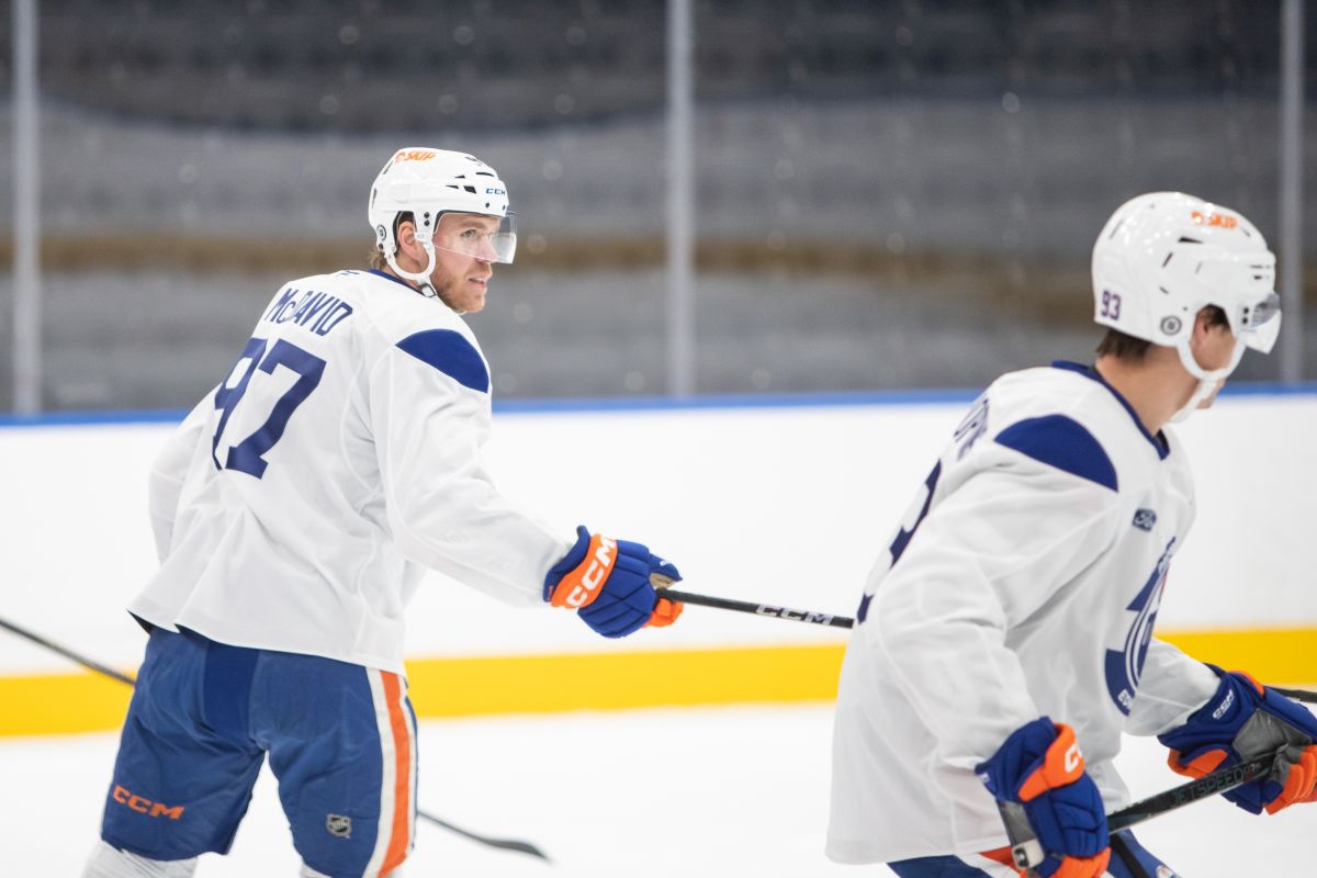 Edmonton Oilers Conor McDavid (97) skates with Ryan Nugent-Hopkins (93) during training camp in Edmonton, on Thursday September 19, 2024.