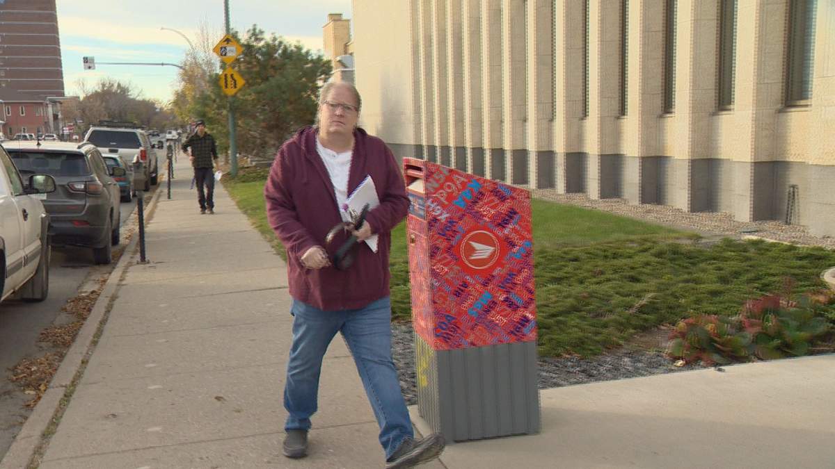 Michael Gordon Jackson makes his way into a Regina courthouse on October 21, 2024.