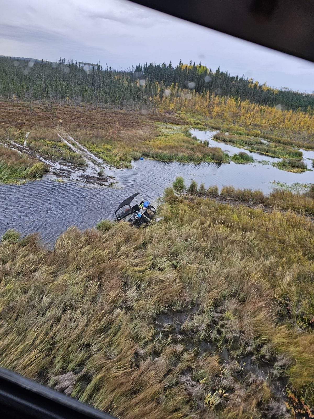 Mounties in northeastern Alberta say they used a helicopter to rescue a stranded trapper on the weekend.