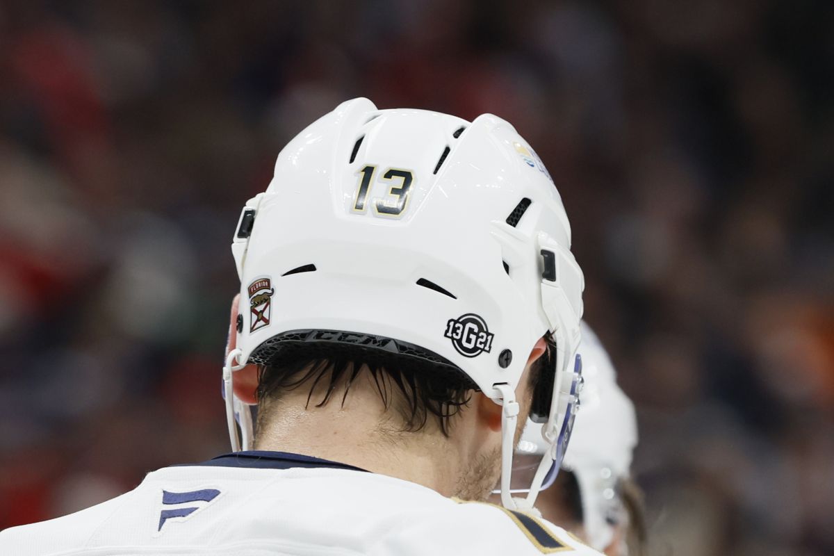 Florida Panthers players, including Sam Reinhart, wear helmet stickers honouring Johnny Gaudreau and his brother Matthew during the first period of an NHL hockey game against the Columbus Blue Jackets Tuesday, Oct. 15, 2024, in Columbus, Ohio. All teams in the NHL will wear helmet stickers honouring the Gaudreau brothers.