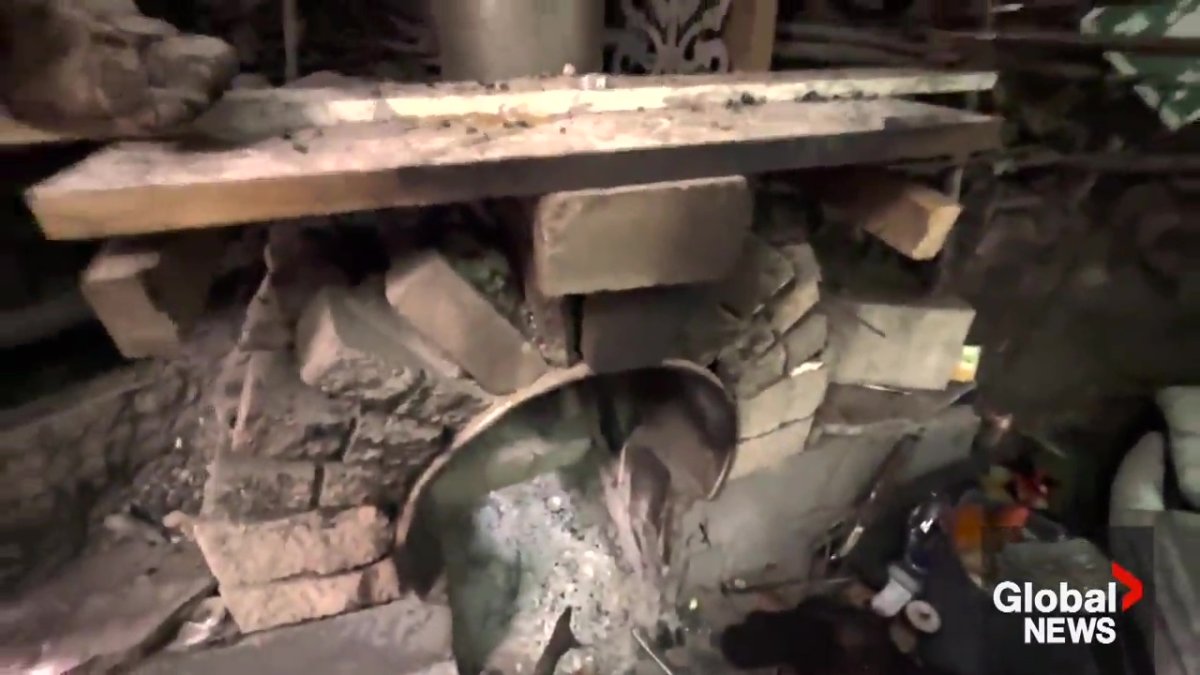 A fireplace inside one of the huts at the encampment in southeast Edmonton.