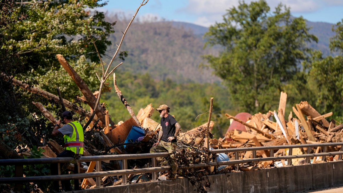 Debris rests on a bridge in the aftermath of Hurricane Helene, Wednesday, Oct. 2, 2024, in Chimney Rock Village, N.C.