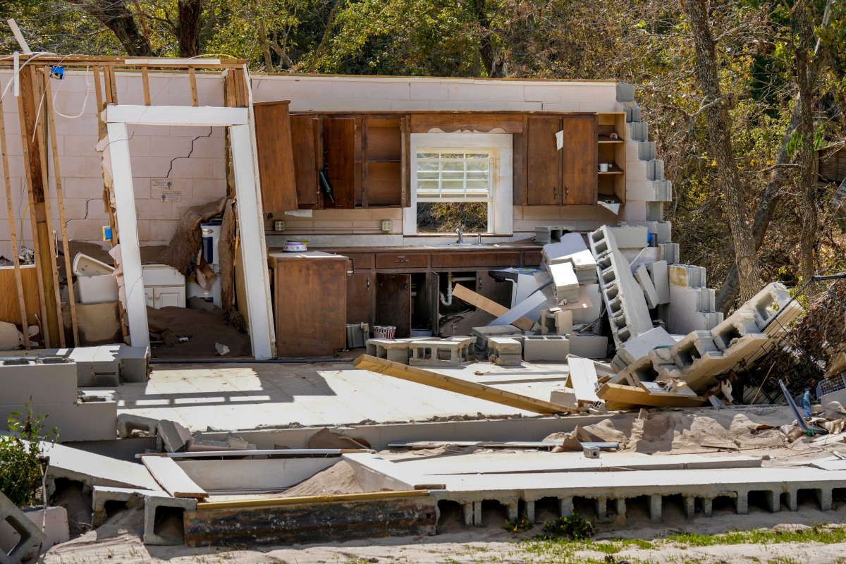 Damaged to one of the White family’s homes that was destroyed by Hurricane Helene is seen, Tuesday, Oct. 1, 2024 in Morganton, N.C. The adjacent Catawba River flooded due to torrential rains destroying seven of the family’s nine homes on the property.