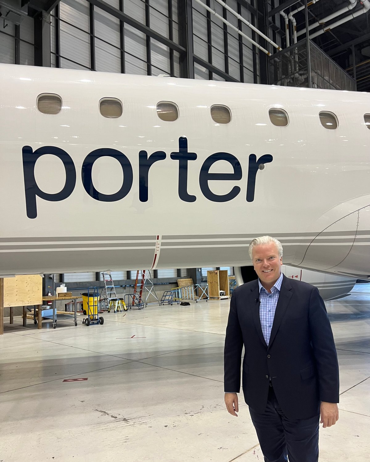 Michael Deluce in front of Porter plane