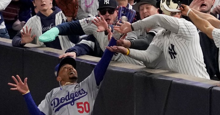 Yankees fans ejected after prying ball out of Mookie Betts’ glove at World Series