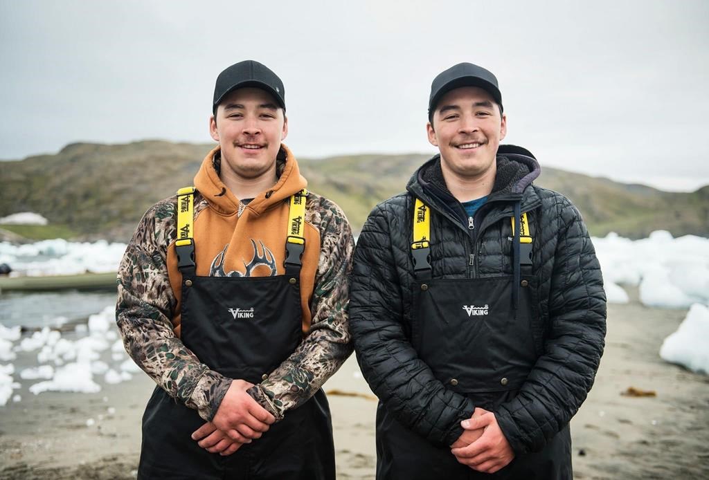 Garnet Papigatuk (left) and Joshua Papigatuk are pictured in an undated family handout photo. A remote northern Quebec community is demanding justice after twin brothers were shot in an altercation with police this week in Salluit, leaving Joshua dead and Garnet seriously injured. THE CANADIAN PRESS/HO.