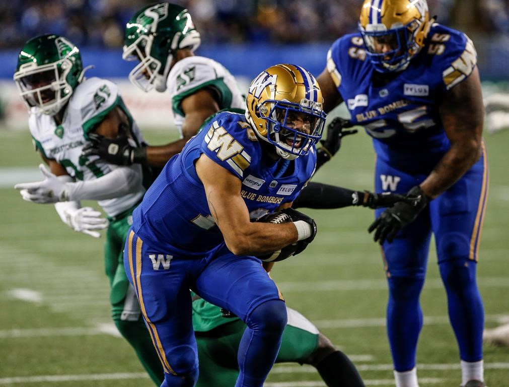 Winnipeg Blue Bombers' Nic Demski (10) crosses the line for the touchdown against the Saskatchewan Roughriders during the first half of CFL Western Conference Final action in Winnipeg Saturday, Nov. 9, 2024.  THE CANADIAN PRESS/John Woods.