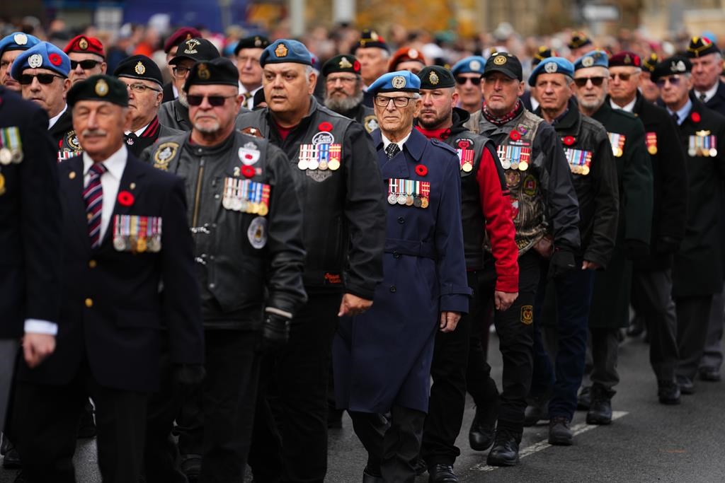 Canadian war veterans march in a parade to a Remembrance Day ceremony at the National War Memorial in Ottawa on Monday, Nov. 11, 2024.