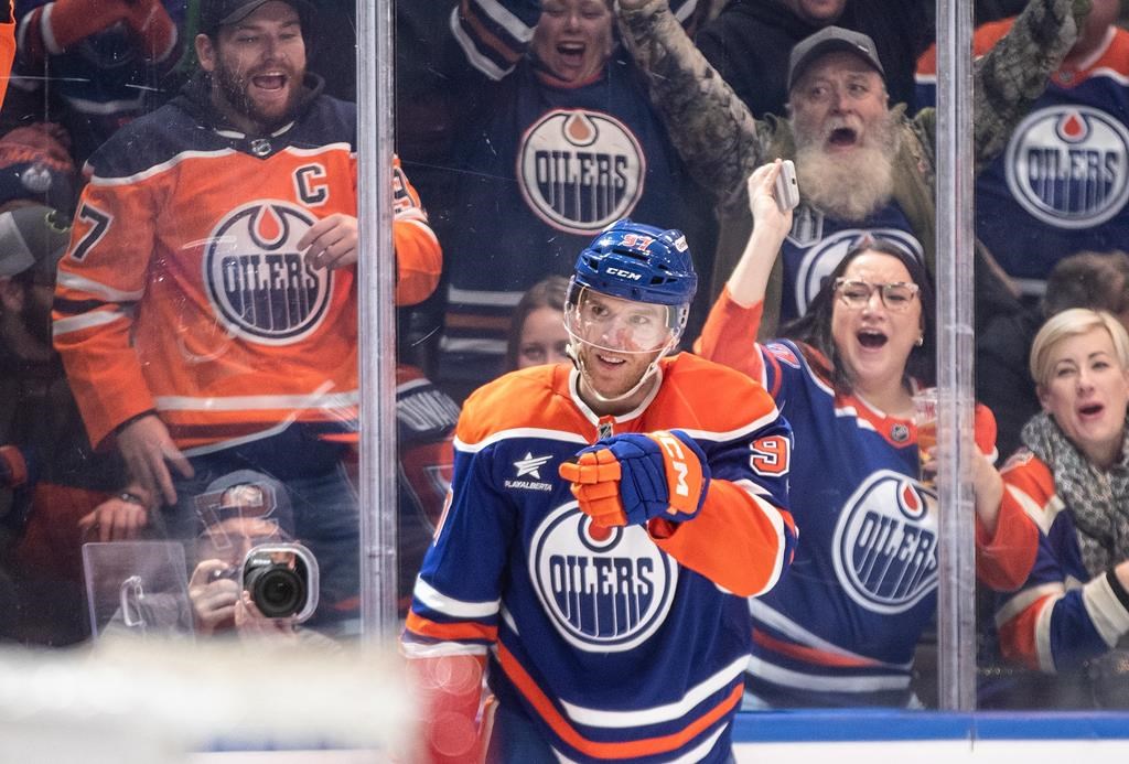 Edmonton Oilers' Connor McDavid (97) celebrates his 1000th point, against the Nashville Predators during second period NHL action in Edmonton on Thursday, November 14, 2024.