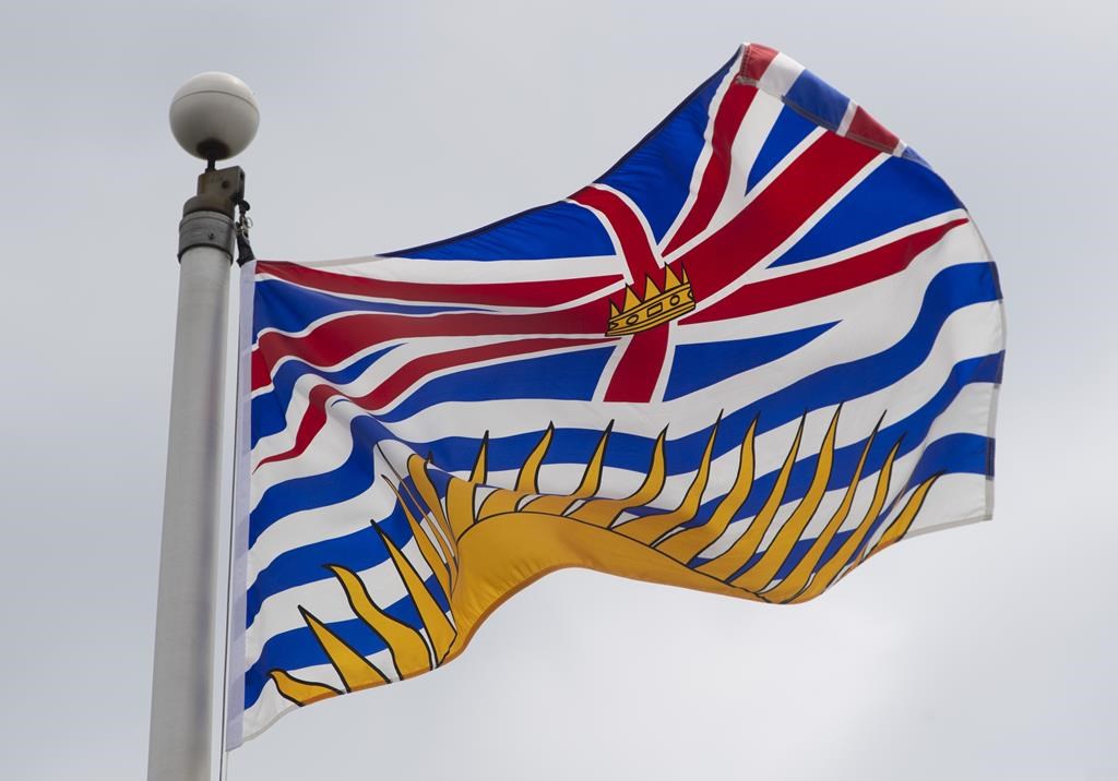 An operating permit has been granted for the Cariboo Gold Mine in central British Columbia for a project that's expected to process 1.1 million tonnes of gold-bearing ore a year. British Columbia's provincial flag flies in Ottawa, July 3, 2020. THE CANADIAN PRESS/Adrian Wyld.