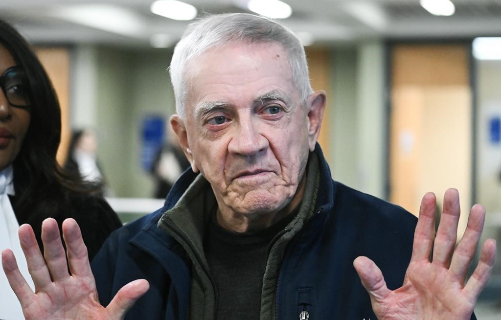 Gilles Brassard speaks to reporters as he arrives for sentencing at the courthouse in Laval, Que., Friday, November 22, 2024. THE CANADIAN PRESS/Graham Hughes.