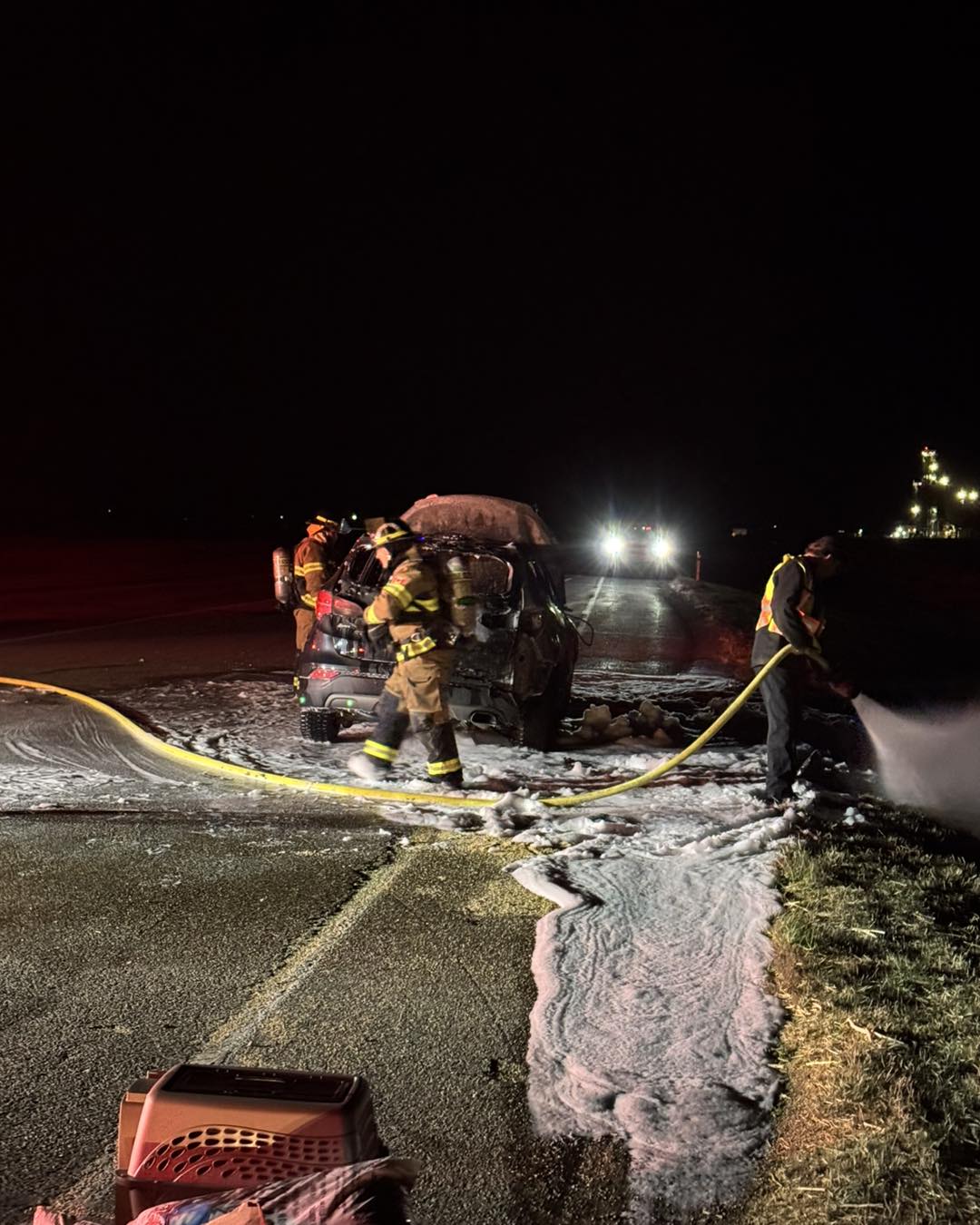 Crews tend to the aftermath of Marc Heethuis-Dubois’s vehicle after he was narrowly able to escape a fire.