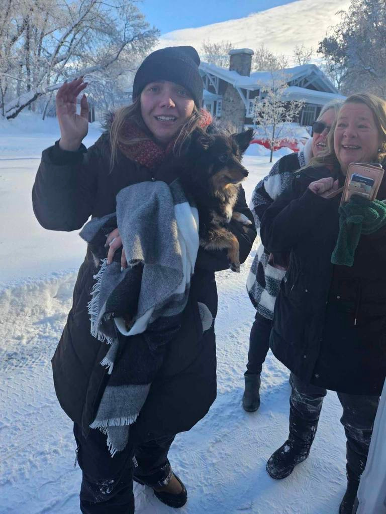 Tamara Fournier holding Bella after she was found.