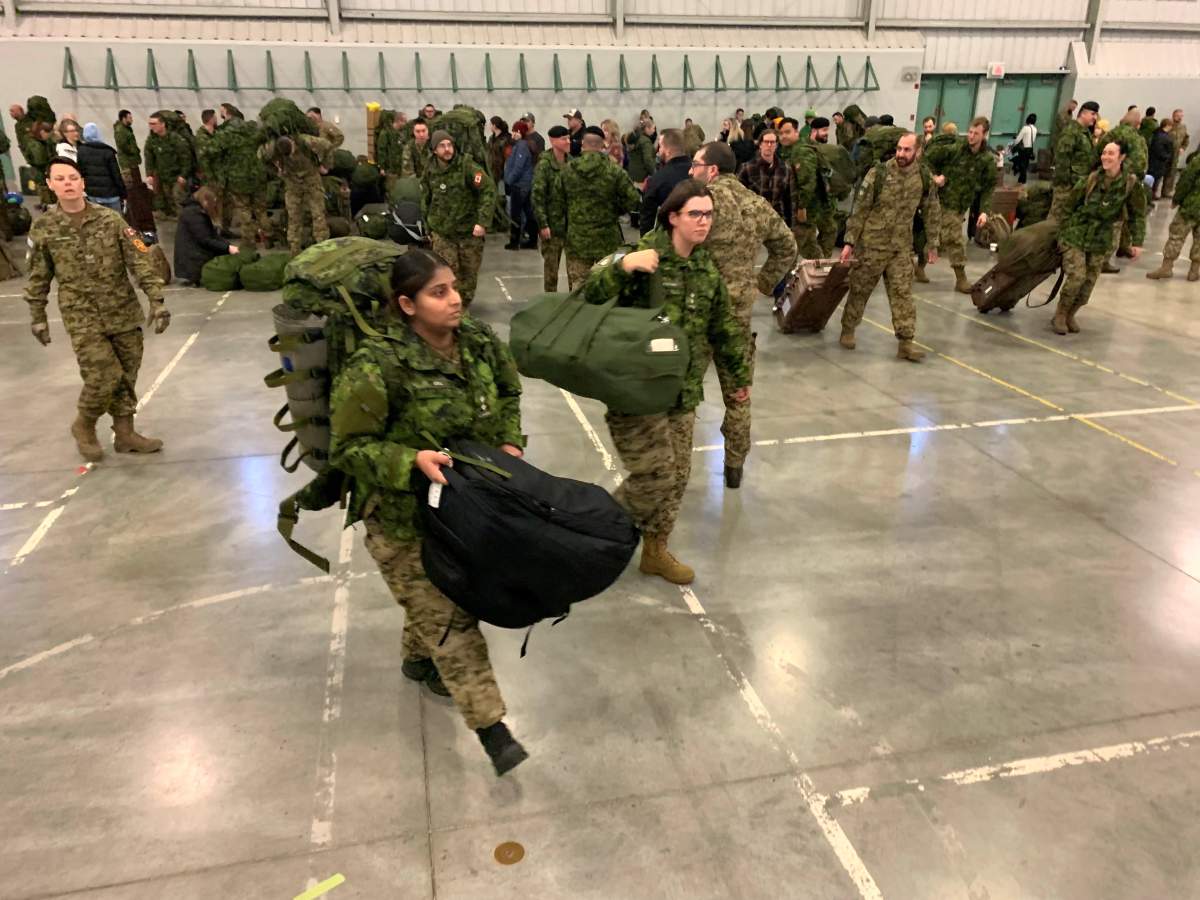 Members of the Canadian Armed Forces are seen leaving Edmonton, heading to Latvia in this photo taken on Nov. 28, 2024.