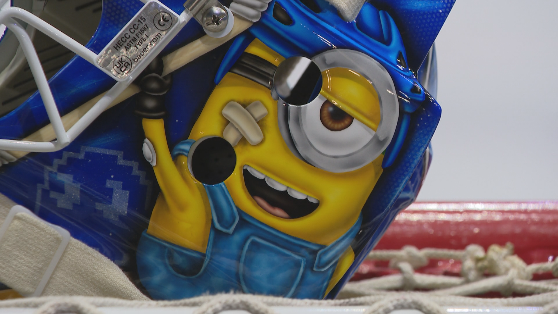 An image of a minion with an insulin pump from the goalie helmet.