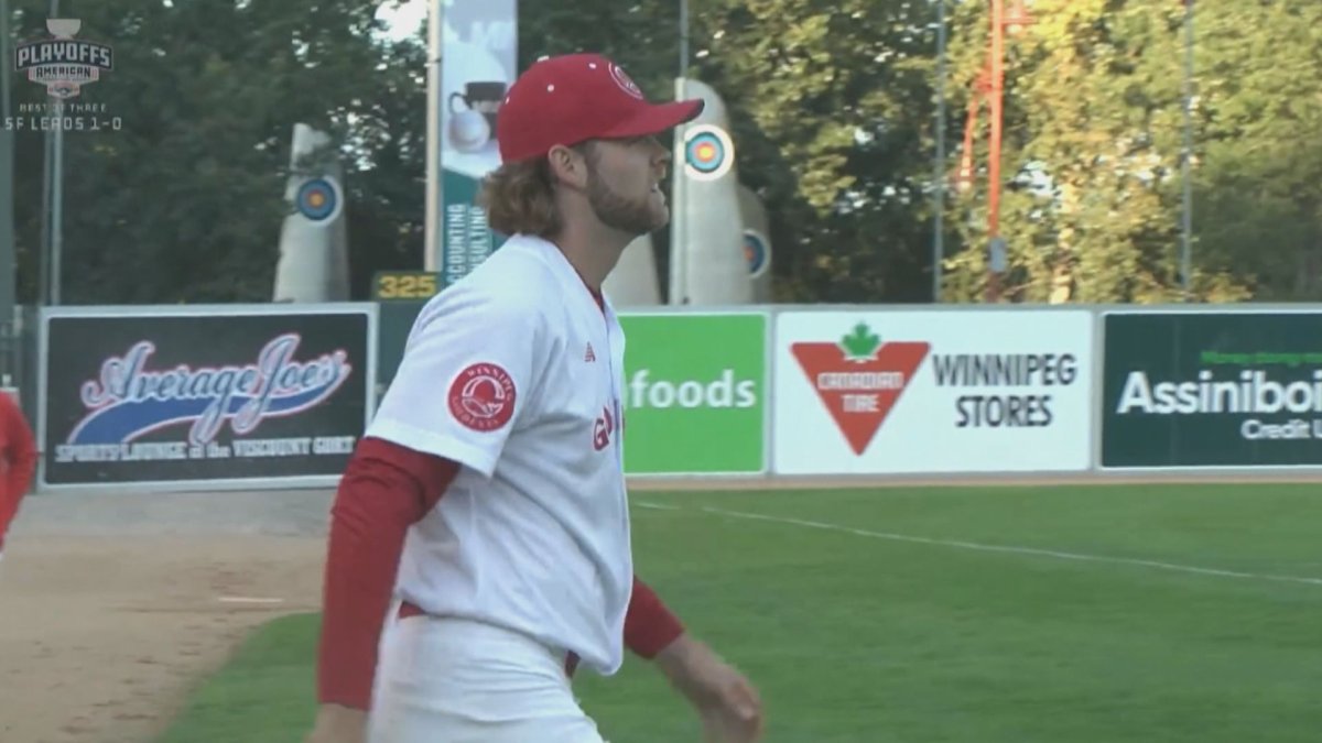 Landen Bourassa walks onto the field for the Winnipeg Goldeyes.