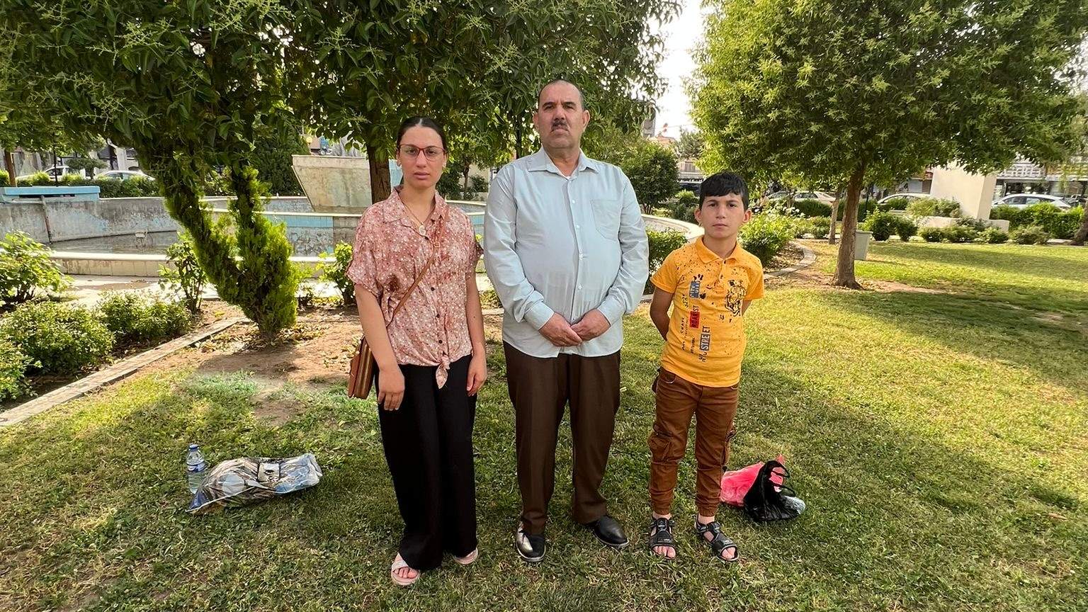 Ali Bashar, centre, survived an ISIS mass execution and now lives in Calgary.